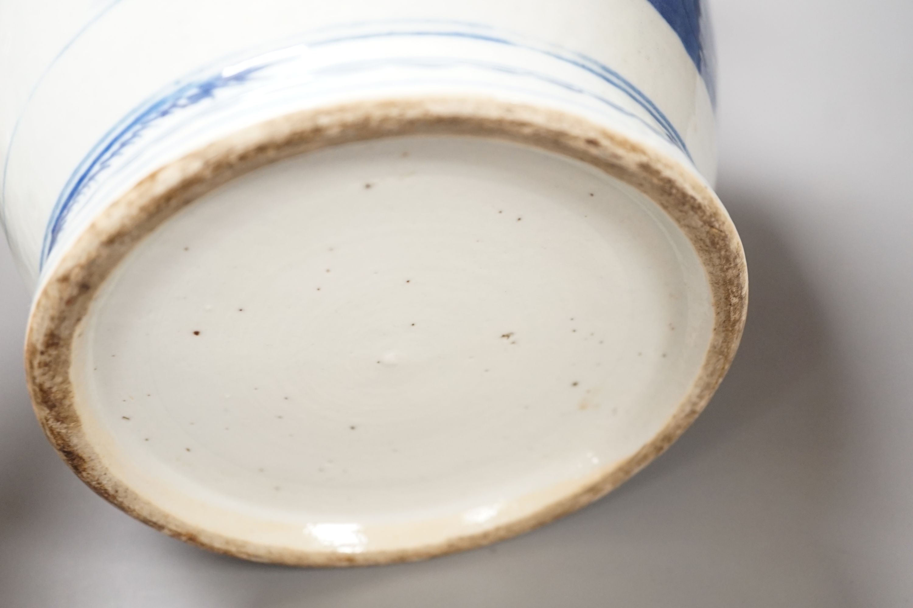 A Chinese blue and white vase and a crackle glaze bottle vase, tallest 34.5 cms high.